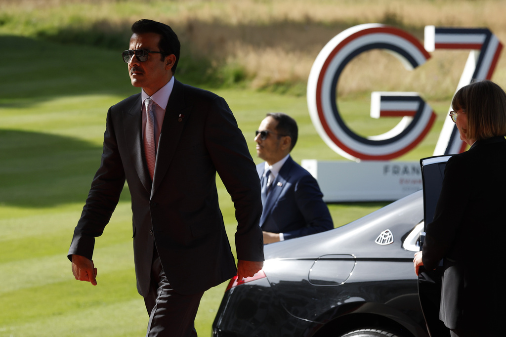 Qatar's Emir Sheikh Tamim bin Hamad Al Thani arrives at the Hotel Royal for a G7 Summit in Evian-les-Bains, France, Tuesday, June 16, 2026. (Yoan Valat/Pool Photo via AP)