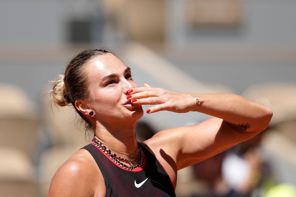 Aryna Sabalenka of Belarus celebrates after winning against Jessica Bouzas Maneiro of Spain during their first round women's singles tennis match at the French Open tennis tournament in Paris, Tuesday, May 26, 2026. (AP Photo/Christophe Ena)