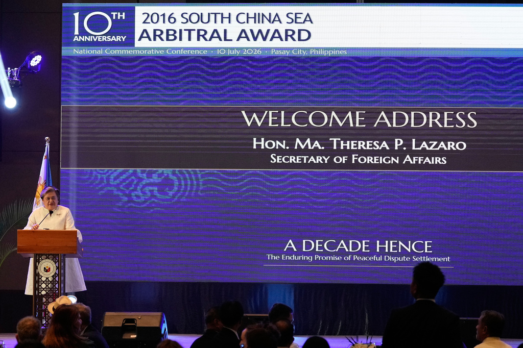 Philippine Foreign Secretary Maria Theresa Lazaro speaks as they mark the 10th anniversary of a 2016 arbitration ruling which invalidated China's expansive claims in the disputed South China Sea during a conference in Manila, Philippines on Friday, July 10, 2026. (AP Photo/Aaron Favila)