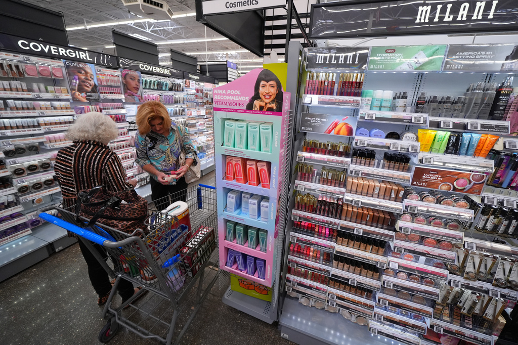Lou Ezzell, left, and Gaylene Schueller shop cosmetics at Walmart near the store's beauty counter Wednesday, April 29, 2026, in Grapevine, Texas. (AP Photo/Julio Cortez)