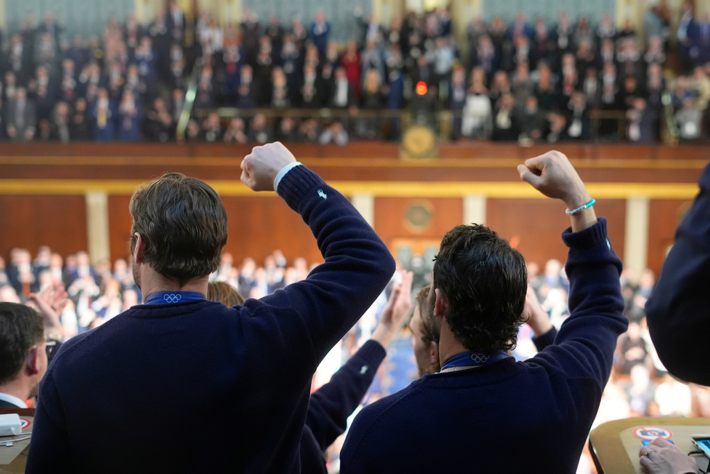 Members of the United States' hockey team attend as President Donald Trump delivers the State of the Union address to a joint session of Congress in the House chamber at the U.S. Capitol in Washington, Tuesday, Feb. 24, 2026. (AP Photo/Pablo Martinez Monsivais)
