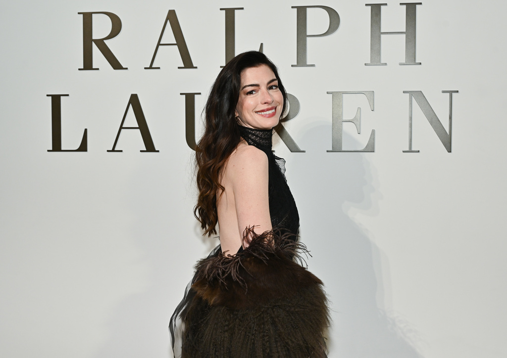 Anne Hathaway attends the Ralph Lauren Fall/Winter 2026 fashion show as part of New York Fashion Week on Tuesday, Feb. 10, 2026, in New York. (Photo by Evan Agostini/Invision/AP)