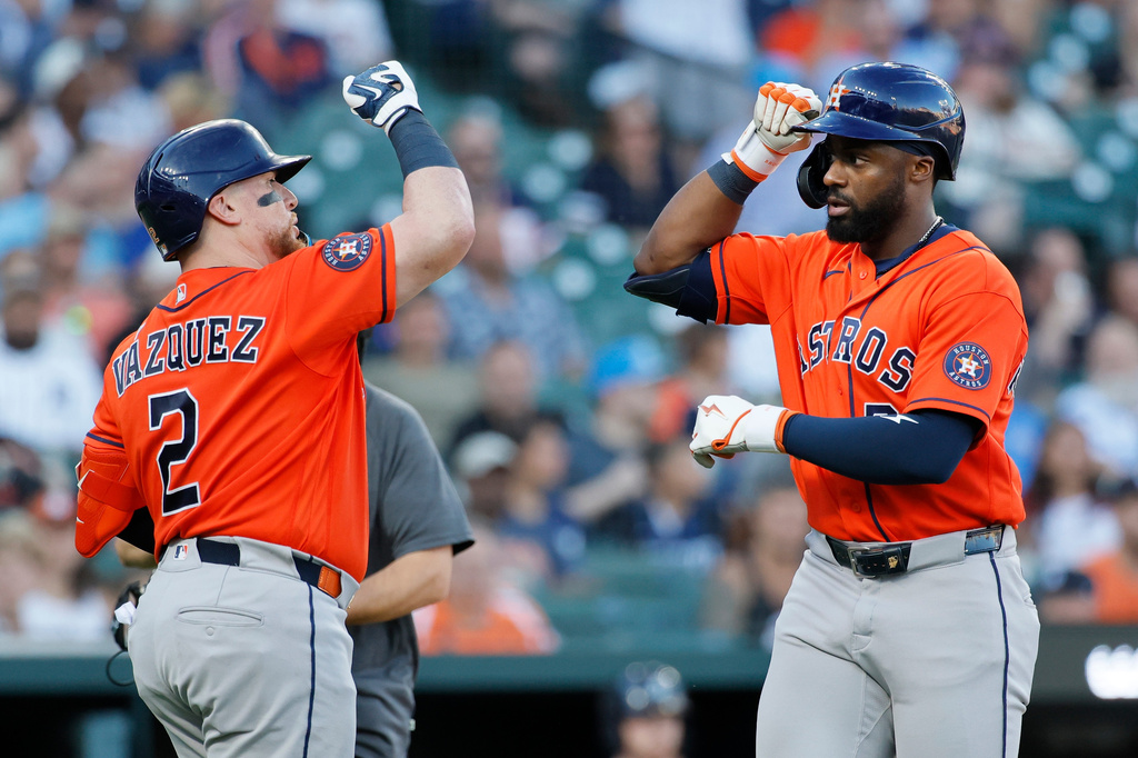 Houston Astros' Taylor Trammell celebrates his solo home run against the Detroit Tigers with Christian Vazquez (2) during the sixth inning of a baseball game Thursday, June 25, 2026, in Detroit. (AP Photo/Duane Burleson)