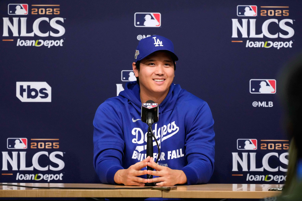 Los Angeles Dodgers' Shohei Ohtani speaks during a news conference ahead of Game 3 of baseball's National League Championship Series against the Milwaukee Brewers, Wednesday, Oct. 15, 2025, in Los Angeles. (AP Photo/Mark J. Terrill)