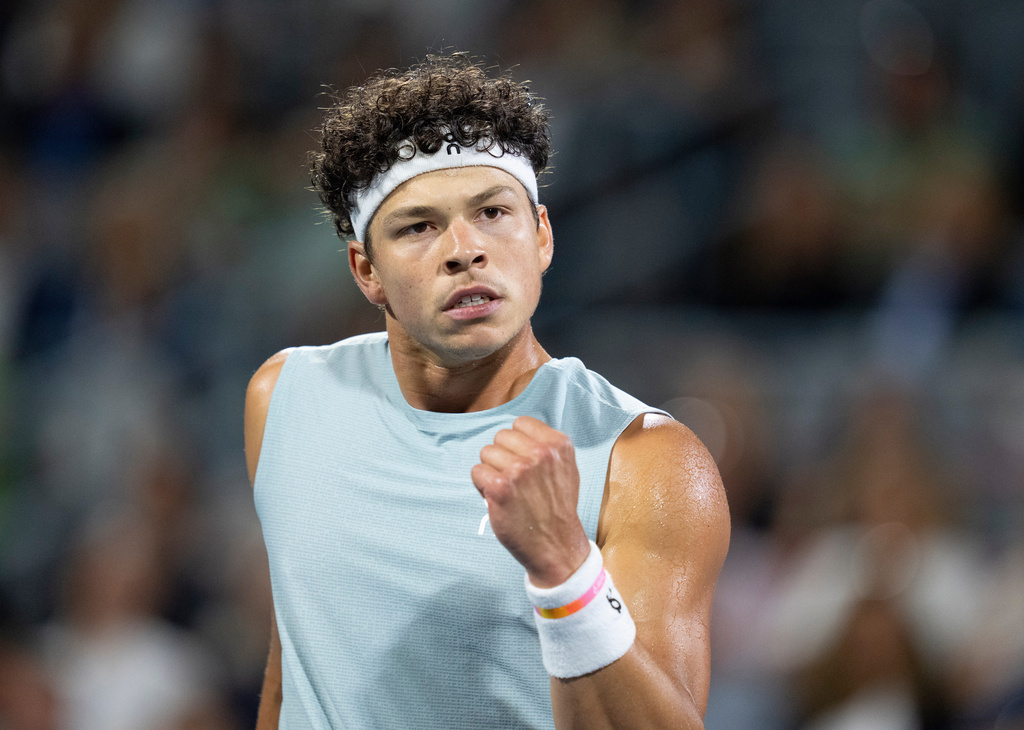 Ben Shelton of the United States reacts during his match against compatriot Learner Tien during a semifinal tennis match at the National Bank Open in Montreal on Wednesday, Aug. 12, 2026. (Christinne Muschi/The Canadian Press via AP)