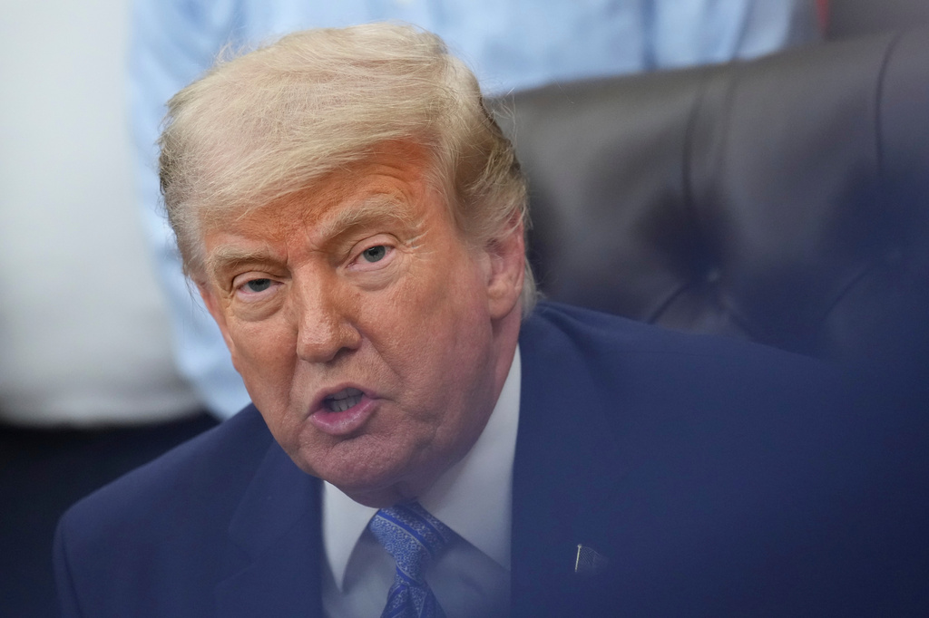 President Donald Trump speaks during an event about loosening a federal refrigerant rule, in the Oval Office at the White House, Thursday, May 21, 2026, in Washington. (AP Photo/Jacquelyn Martin)