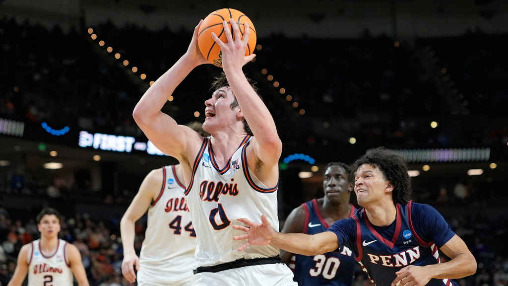Illinois forward David Mirkovic (0) shoots during the first half in the first round of the NCAA college basketball tournament against Pennsylvania, Thursday, March 19, 2026, in Greenville, S.C. (AP Photo/Brynn Anderson)