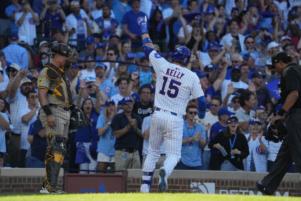 Chicago Cubs' Carson Kelly reacts after hitting a home run during the fifth inning of Game 1 of a National League wild card baseball game against the San Diego Padres Tuesday, Sept. 30, 2025, in Chicago. (AP Photo/Nam Huh)