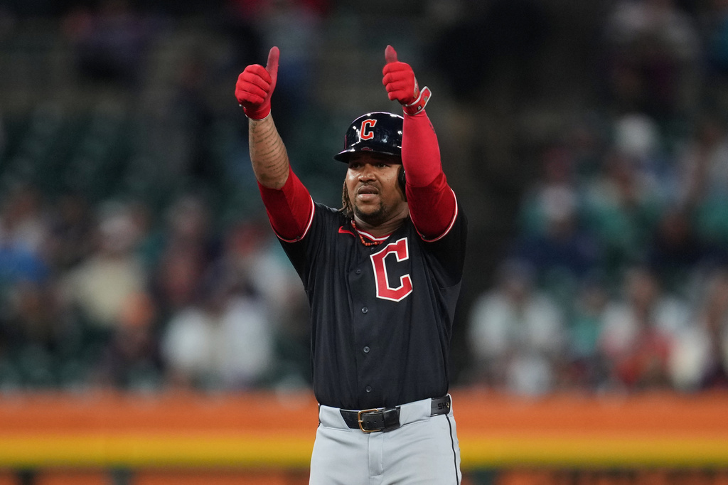 Cleveland Guardians' José Ramírez reacts to his one-run double against the Detroit Tigers during the 10th inning of a baseball game Wednesday, May 20, 2026, in Detroit. (AP Photo/Paul Sancya)