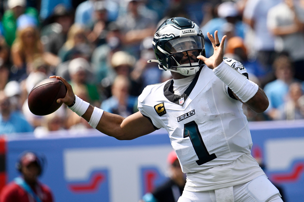 Philadelphia Eagles quarterback Jalen Hurts throws a pass during the first half of an NFL football game against the Tennessee Titans, Sunday, Sept. 20, 2026, in Nashville, Tenn.(AP Photo/John Amis)