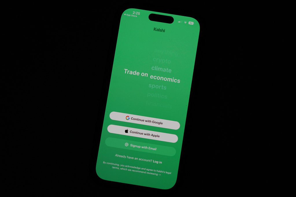 HOLD The prediction market app Kalshi is displayed on a mobile phone Thursday, April 16, 2026, in Chicago. (AP Photo/Erin Hooley)