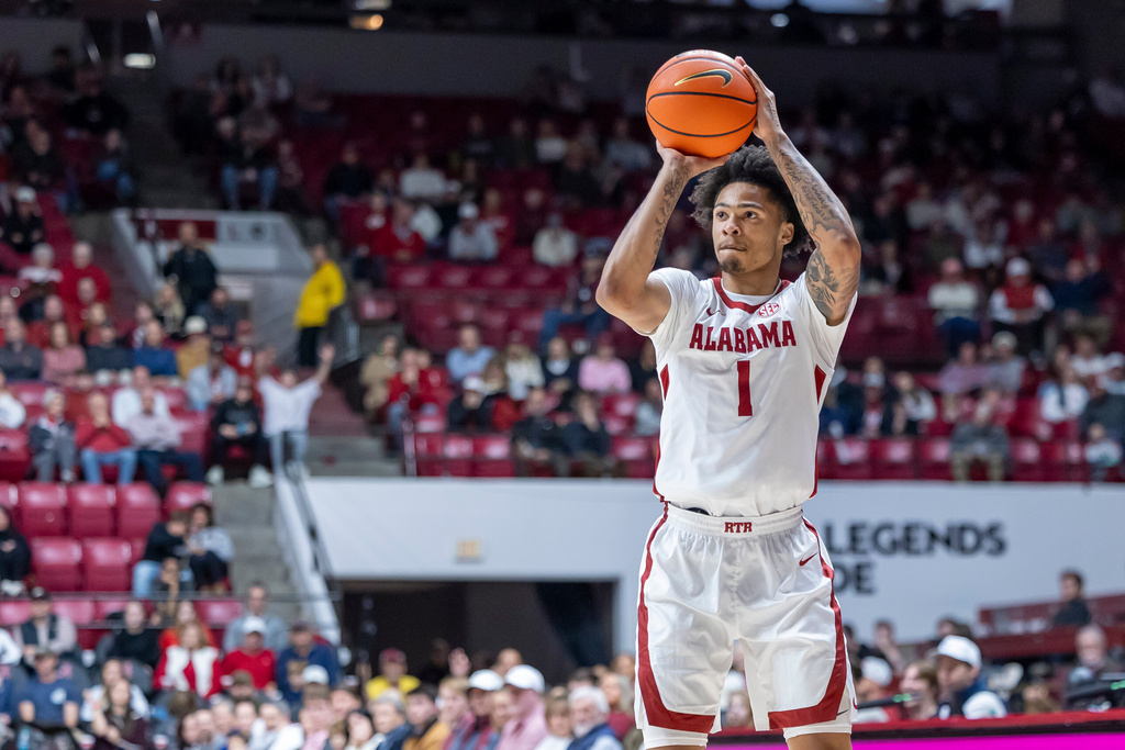 Alabama guard Jalil Bethea (1) shoots for three against Yale during the first half of an NCAA college basketball game Monday, Dec. 29, 2025, in Tuscaloosa, Ala. (AP Photo/Vasha Hunt)