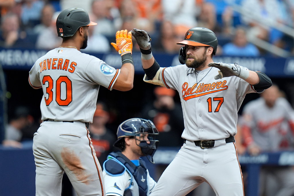 Baltimore Orioles' Colton Cowser (17) celebrates his two-run home run off Tampa Bay Rays pitcher Steven Matz with Leody Taveras (30) during the sixth inning of a baseball game Sunday, Aug. 16, 2026, in St. Petersburg, Fla. (AP Photo/Chris O'Meara)