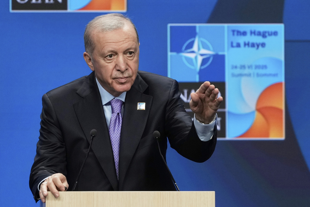 FILE - Turkish President Recep Tayyip Erdogan gestures during a press conference after the plenary session at the NATO summit in The Hague, Netherlands, on June 25, 2025. (AP Photo/Markus Schreiber, File)