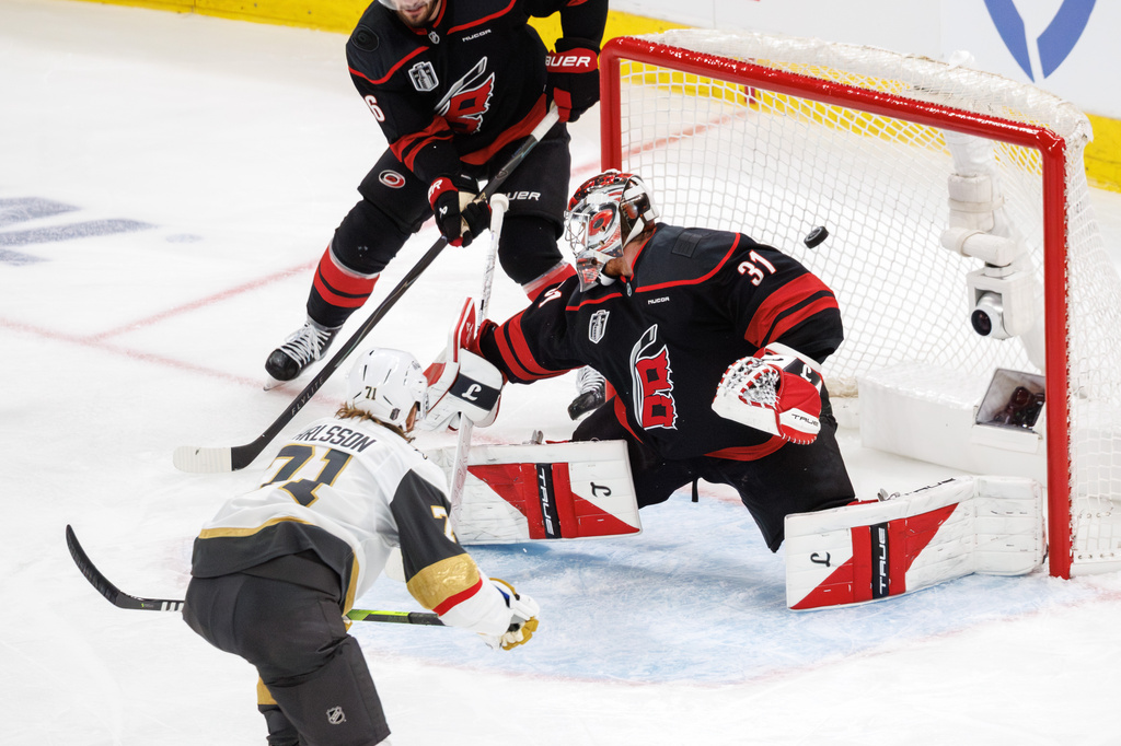 Vegas Golden Knights' William Karlsson (71) scores a goal past Carolina Hurricanes' Frederik Andersen (31) during the second period of Game 1 of the NHL hockey Stanley Cup Final series in Raleigh, N.C., Tuesday, June 2, 2026. (AP Photo/Ben McKeown)