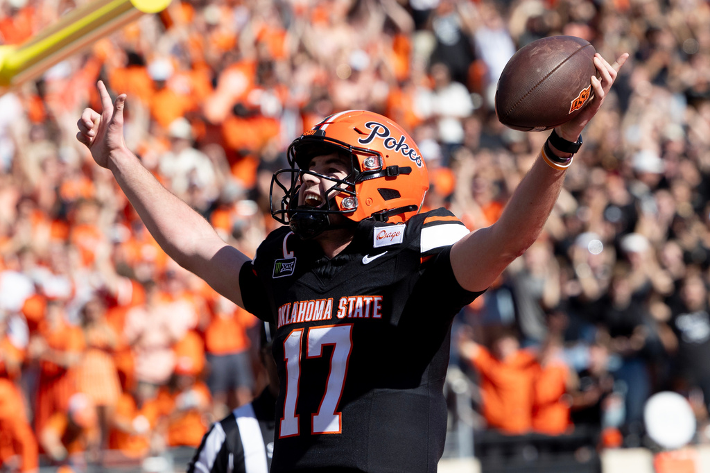 Oklahoma State quarterback Drew Mestemaker (17) celebrates in the end zone after a touchdown in the first half of the NCAA college football game against Central Florida in Stillwater, Okla., Saturday, Oct. 10, 2026. (AP Photo/Mitch Alcala)