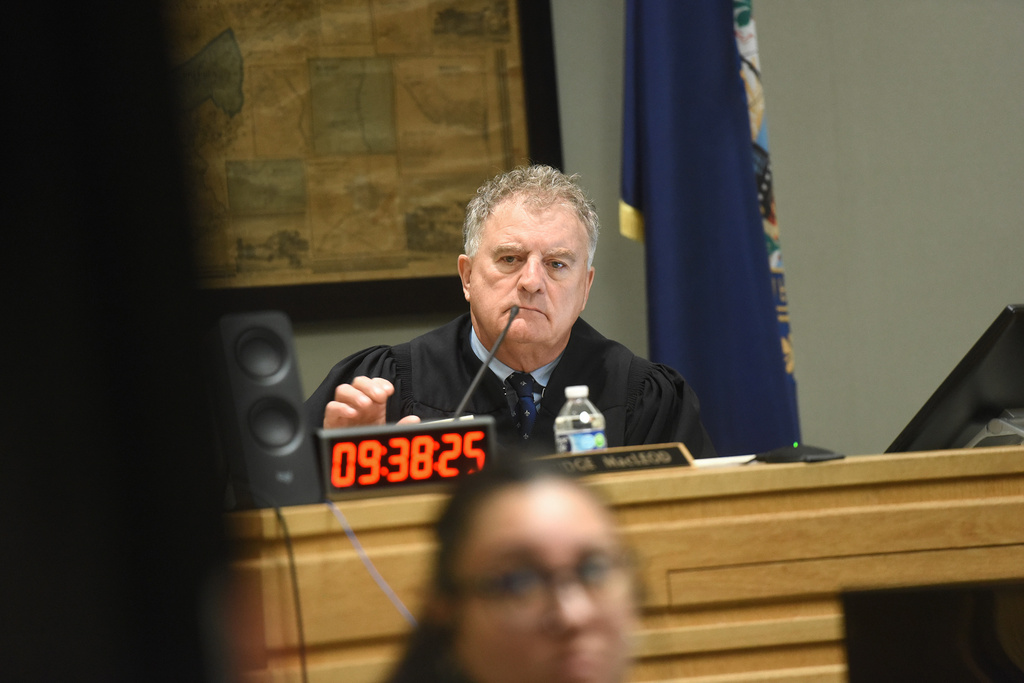 Judge Lawrence MacLeod watches Veronika Zantop the daughter of Half and Susanne Zantop give a statement via video during the resentencing of Robert Tulloch on Monday, July 13, 2026, in Grafton Superior Court in North Haverhill, N.H. (Jennifer Hauck/Valley News via AP, Pool)