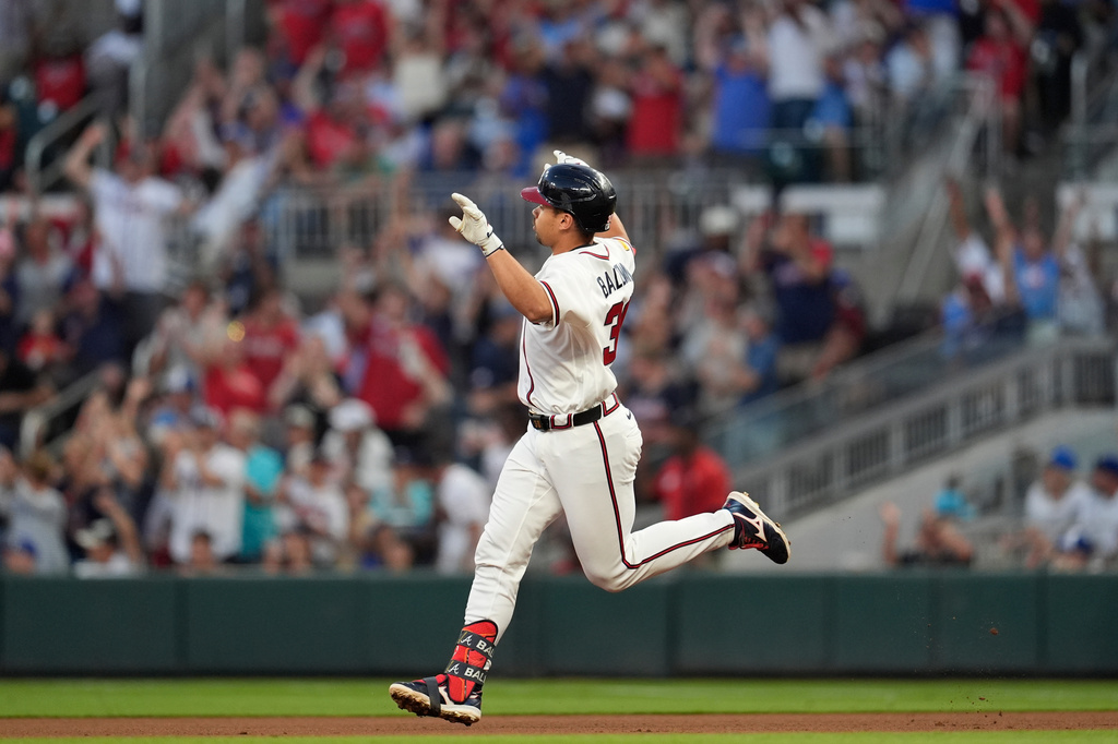 Atlanta Braves' Drake Baldwin celebrates his a solo homer in the fourth inning of a baseball game against the Chicago Cubs, Wednesday, May 13, 2026, in Atlanta. (AP Photo/Mike Stewart)