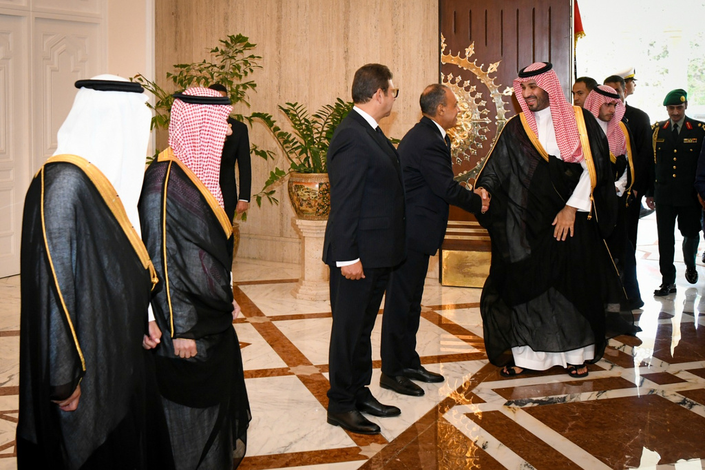 In this photo provided by the Egyptian Presidential Press Office, Saudi Crown Prince Mohammed bin Salman, center right, greets Egyptian officials at the Presidential Palace in Cairo, Egypt, Tuesday, Sept. 15, 2026. (Egyptian Presidential Press Office via AP)