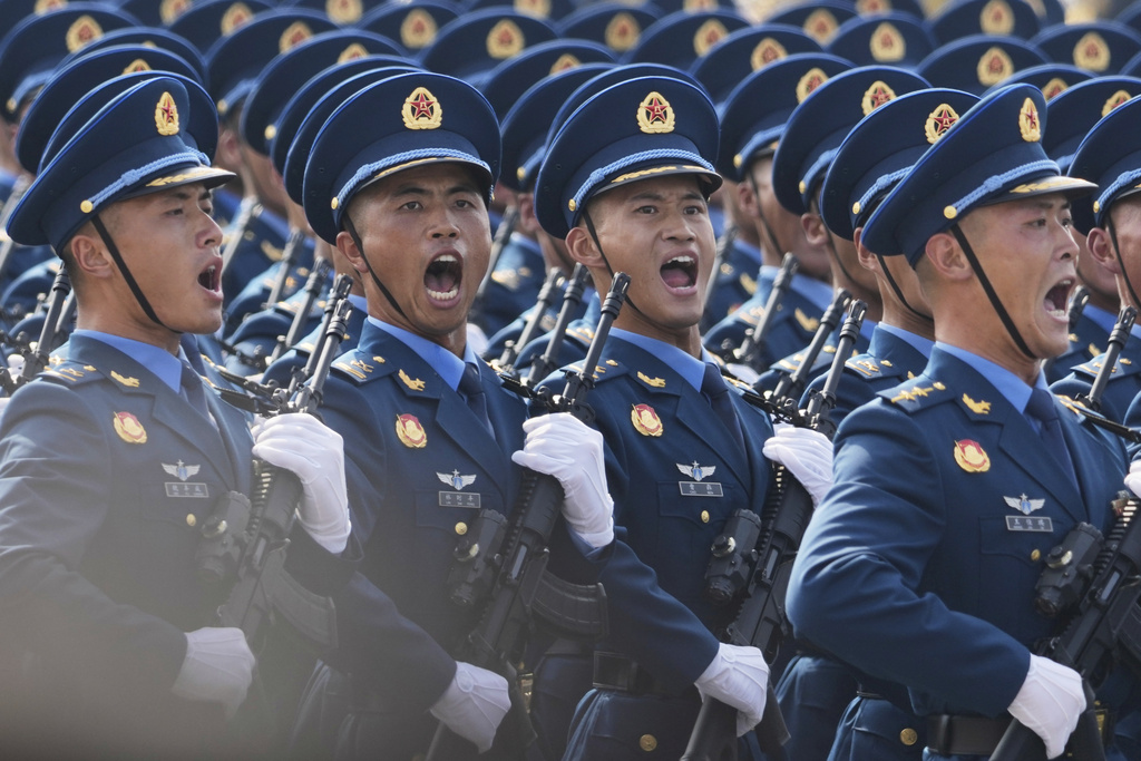 Military personnel take part in a military parade to commemorate the 80th anniversary of Japan's World War II surrender held in front of Tiananmen Gate in Beijing, Wednesday, Sept. 3, 2025. (AP Photo/Ng Han Guan)