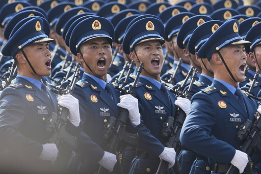 Military personnel take part in a military parade to commemorate the 80th anniversary of Japan's World War II surrender held in front of Tiananmen Gate in Beijing, Wednesday, Sept. 3, 2025. (AP Photo/Ng Han Guan) Military personnel take part in a military parade to commemorate the 80th anniversary of Japan's World War II surrender held in front of Tiananmen Gate in Beijing, Wednesday, Sept. 3, 2025. (AP Photo/Ng Han Guan)