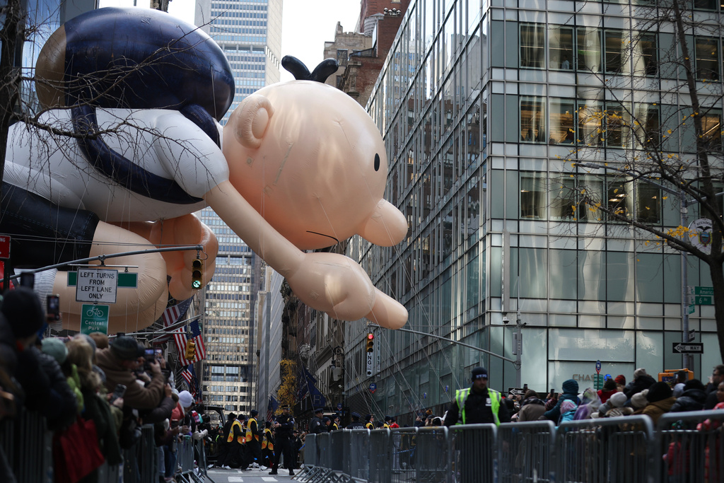 The Diary of a Wimpy Kid balloon makes its way down Sixth Avenue during the Macy's Thanksgiving Day Parade, Thursday, Nov. 27, 2025, in New York. (AP Photo/Heather Khalifa)
