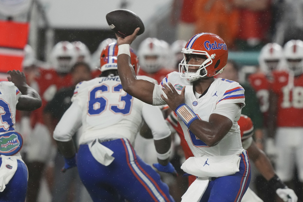 Florida quarterback DJ Lagway (2) aims a pass during the first half of an NCAA college football game against Miami, Saturday, Sept. 20, 2025, in Miami Gardens, Fla. (AP Photo/Marta Lavandier)
