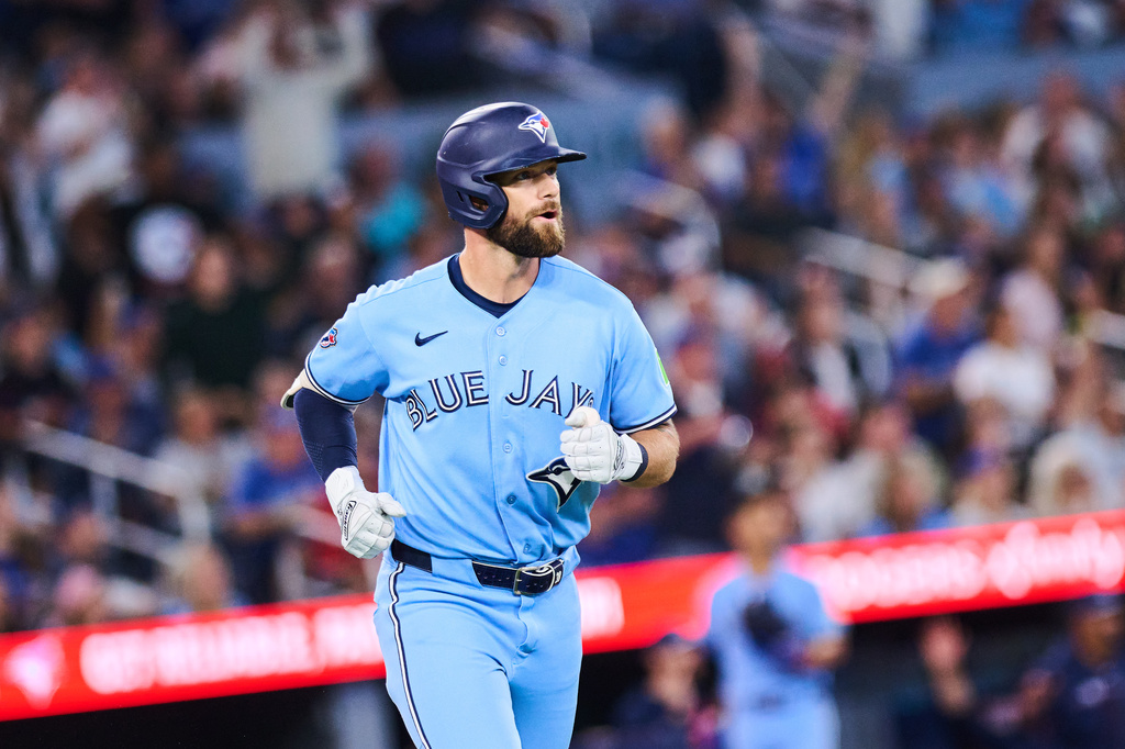 Toronto Blue Jays' Nathan Lukes reacts as he rounds the bases after hitting a three-run home run against the Kansas City Royals during the fourth inning of a baseball game in Toronto, Wednesday, Aug. 26, 2026. (Sammy Kogan/The Canadian Press via AP)
