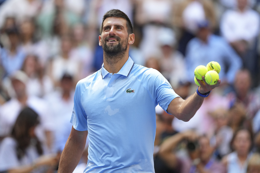 Novak Djokovic, of Serbia, reacts to the crowd after defeating Zachary Svajda, of the United States, during the second round of the U.S. Open tennis championships, Wednesday, Aug. 27, 2025, in New York. (AP Photo/Kirsty Wigglesworth)