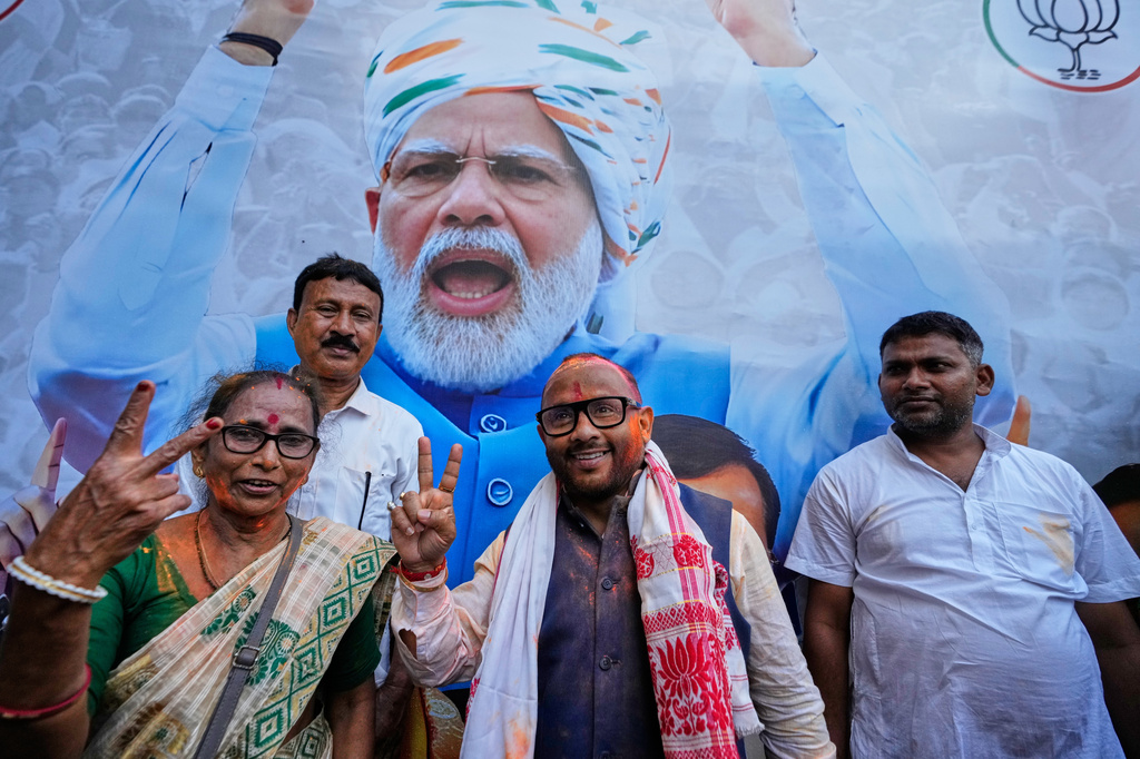 Diplu Ranjan Sarmah, center, New Guwahati candidate of Bharatiya Janata Party shows victory sign after winning in recent held state election in Guwahati, India, Monday, May 4, 2026. (AP Photo/Anupam Nath)