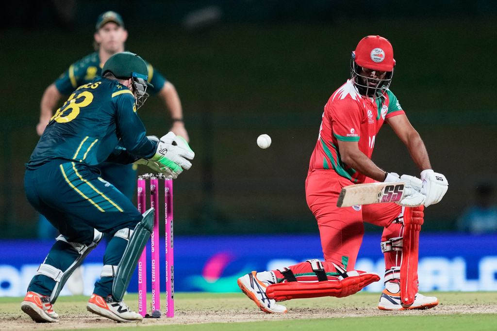 Oman's Vinayak Shukla plays a shot during the T20 World Cup cricket match between Australia and Oman in Pallekele, Sri Lanka, Friday, Feb. 20, 2026. (AP Photo/Eranga Jayawardena)