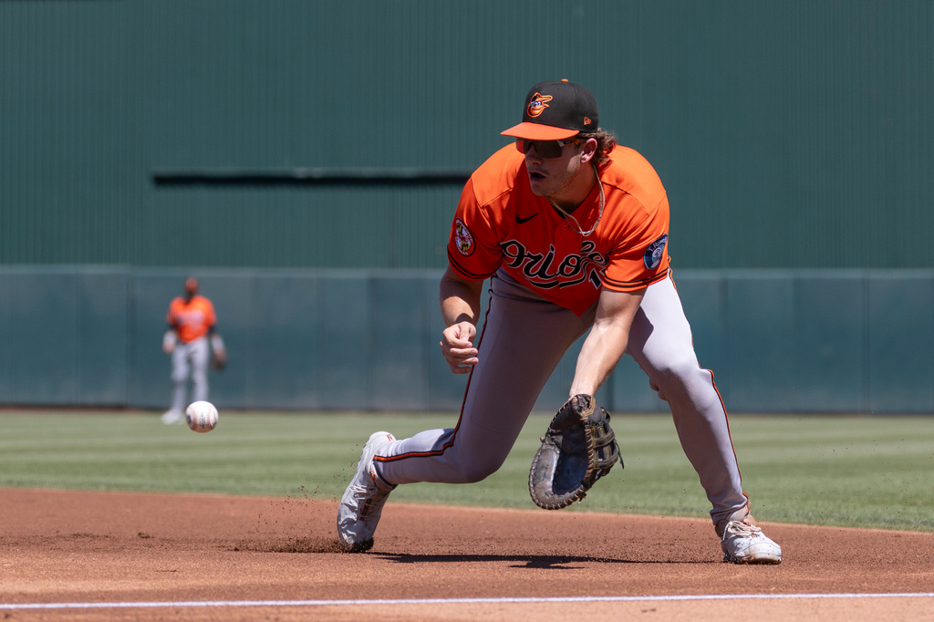 Baltimore Orioles first baseman Coby Mayo fields a ball during the first inning of a baseball game against the Athletics, Sunday, Aug. 30, 2026, in West Sacramento, Calif. (AP Photo/Sara Nevis)