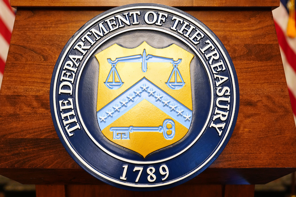 The seal of the Treasury Department is pictured before Treasury Secretary Scott Bessent arrives to speak at a news conference, Monday, Aug. 24, 2026, at the Treasury Department in Washington. (AP Photo/Julia Demaree Nikhinson)