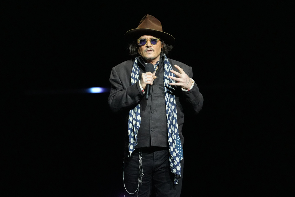 Johnny Depp, a cast member in the upcoming film "Ebenezer: A Christmas Carol," speaks during the Paramount Pictures presentation at CinemaCon on Thursday, April 16, 2026, at Caesars Palace in Las Vegas. (AP Photo/Chris Pizzello)