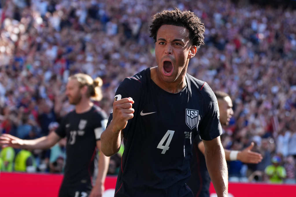 United States' Tyler Adams celebrates after Malik Tillman scored their first goal from a free kick during the World Cup round of 16 soccer match between the United States and Belgium in Seattle, Monday, July 6, 2026. (AP Photo/Abbie Parr)