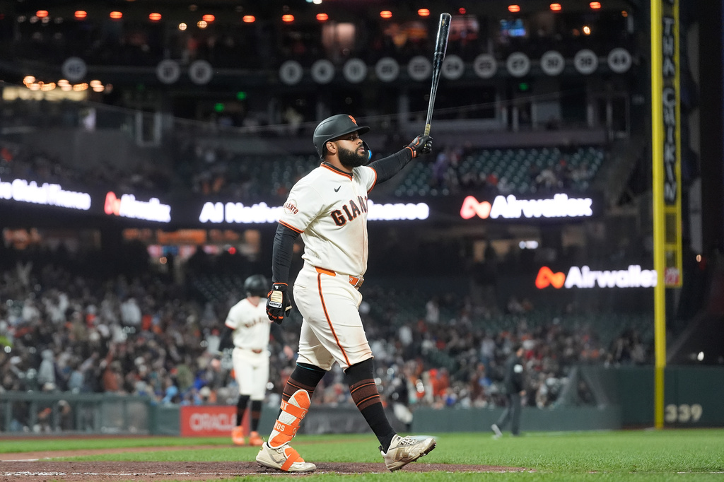 San Francisco Giants' Heliot Ramos gestures after hitting a two-run home run during the eighth inning of a baseball game against the Toronto Blue Jays Monday, July 6, 2026, in San Francisco. (AP Photo/Jeff Chiu)