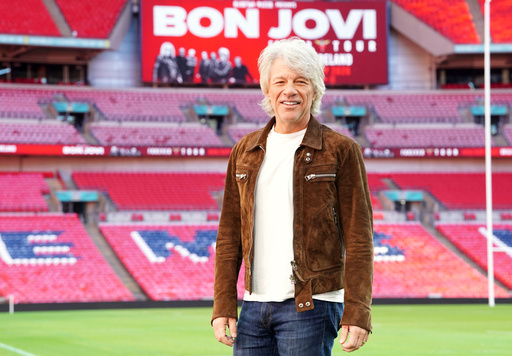 Singer Jon Bon Jovi poses for a photo at a press conference at Wembley Stadium to make an announcement and promote his new collaborations album, Forever, in north London, Friday, Oct. 24, 2025. (Ian West/PA via AP) Singer Jon Bon Jovi poses for a photo at a press conference at Wembley Stadium to make an announcement and promote his new collaborations album, Forever, in north London, Friday, Oct. 24, 2025. (Ian West/PA via AP)
