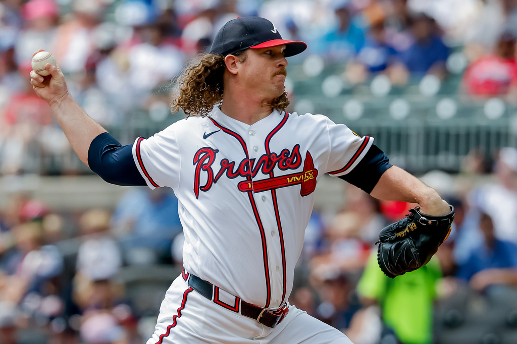 Atlanta Braves pitcher Grant Holmes delivers to a Philadelphia Phillies batter during the first inning of a baseball game, Sunday, Sept. 13, 2026, in Atlanta. (AP Photo/Erik S. Lesser)