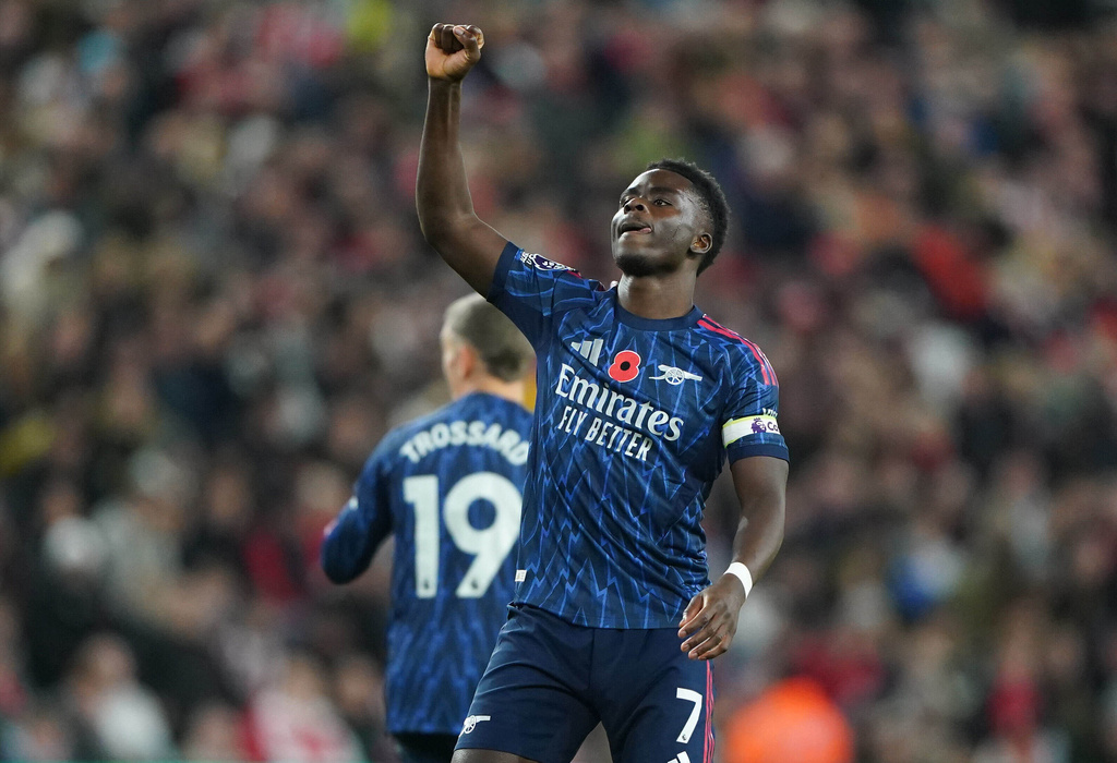 Arsenal's Bukayo Saka celebrates scoring their side's first goal during the English Premier League soccer match between Arsenal and Sunderland, in Sunderland, England, Saturday Nov. 8, 2025. (Owen Humphreys/PA via AP)