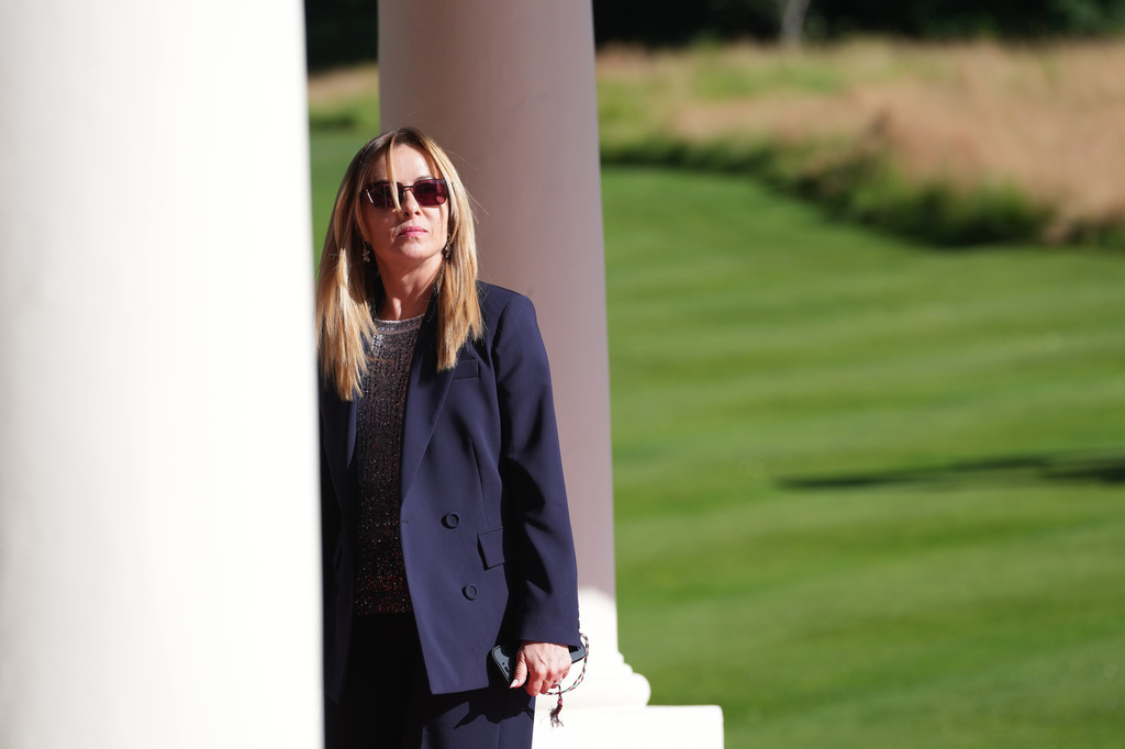 Italian Prime Minister Giorgia Meloni arrives for the G7 summit in Evian-les-Bains, France, Monday, June 15, 2026. (AP Photo/Thibault Camus)