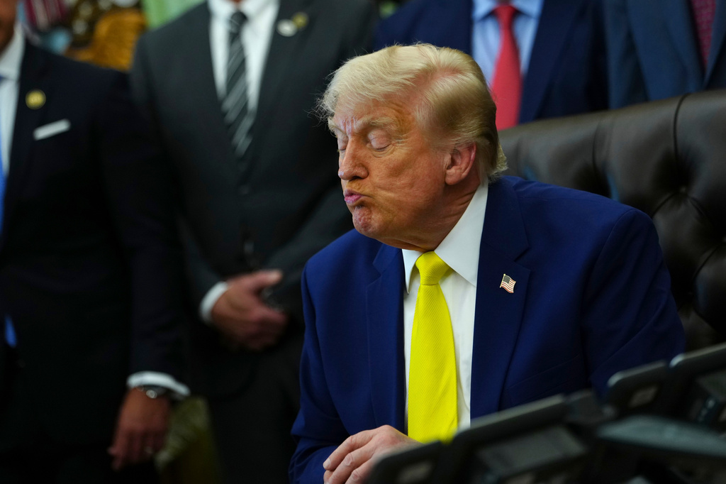 President Donald Trump listens at an event about coal, Thursday, June 4, 2026, in the Oval Office of the White House in Washington. (AP Photo/Julia Demaree Nikhinson)