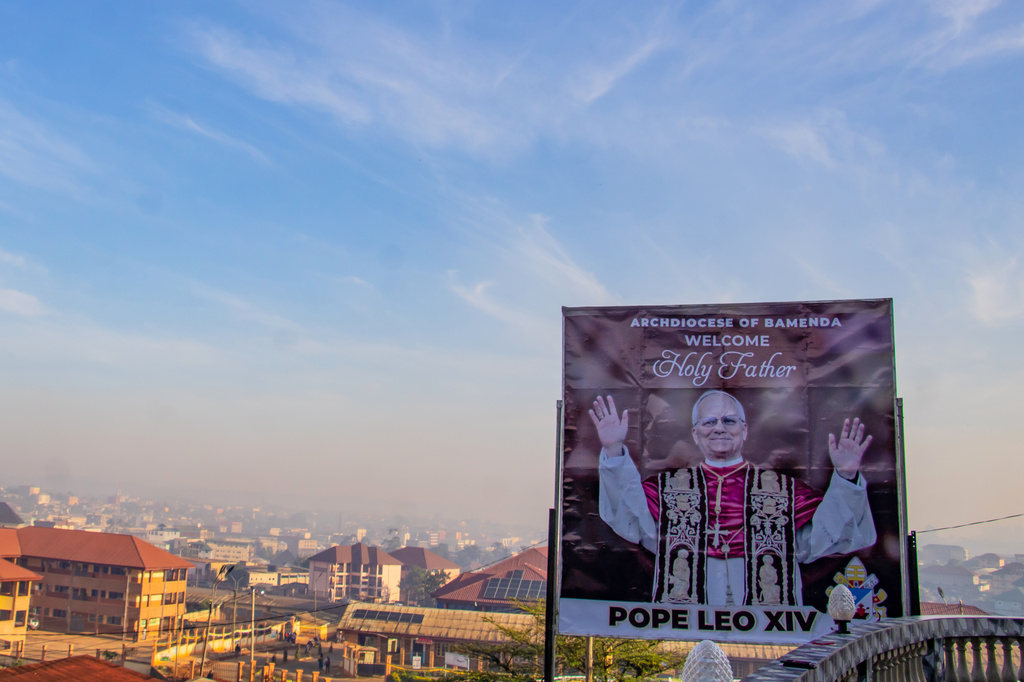 A roadside billboard welcomes Holy Father Pope Leo XIV to Bamenda, Cameroon, Tuesday, April 14, 2026. (AP Photo/Welba Yamo Pascal)