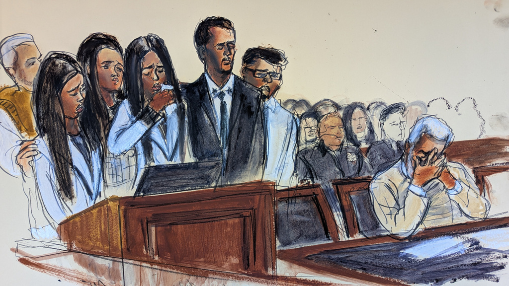 In this courtroom sketch, D'Lila Combs, left center, makes a statement surrounded by family as Sean Diddy Combs, right, reacts during his sentencing hearing in Manhattan federal court, Friday, Oct. 3, 2025, in New York. (Elizabeth Williams via AP)