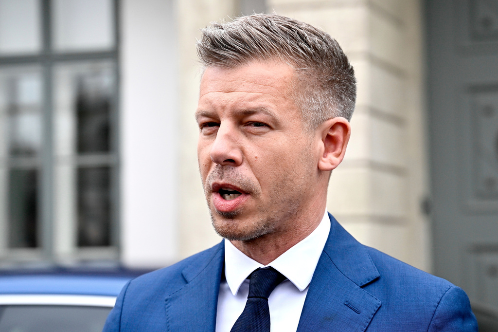 Peter Magyar, leader of the election-winning Tisza Party, talks to the media before meeting Hungarian President Tamas Sulyok in the presidential Alexander Palace in Budapest, Hungary, Wednesday April 15, 2026. (Robert Hegedus/MTI via AP)