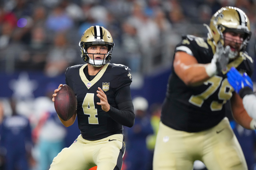 New Orleans Saints quarterback Zach Wilson (4) throws against the Dallas Cowboys during the second half a preseason NFL football game, in Arlington, Texas, Friday, Aug. 28, 2026. (AP Photo/Julio Cortez)