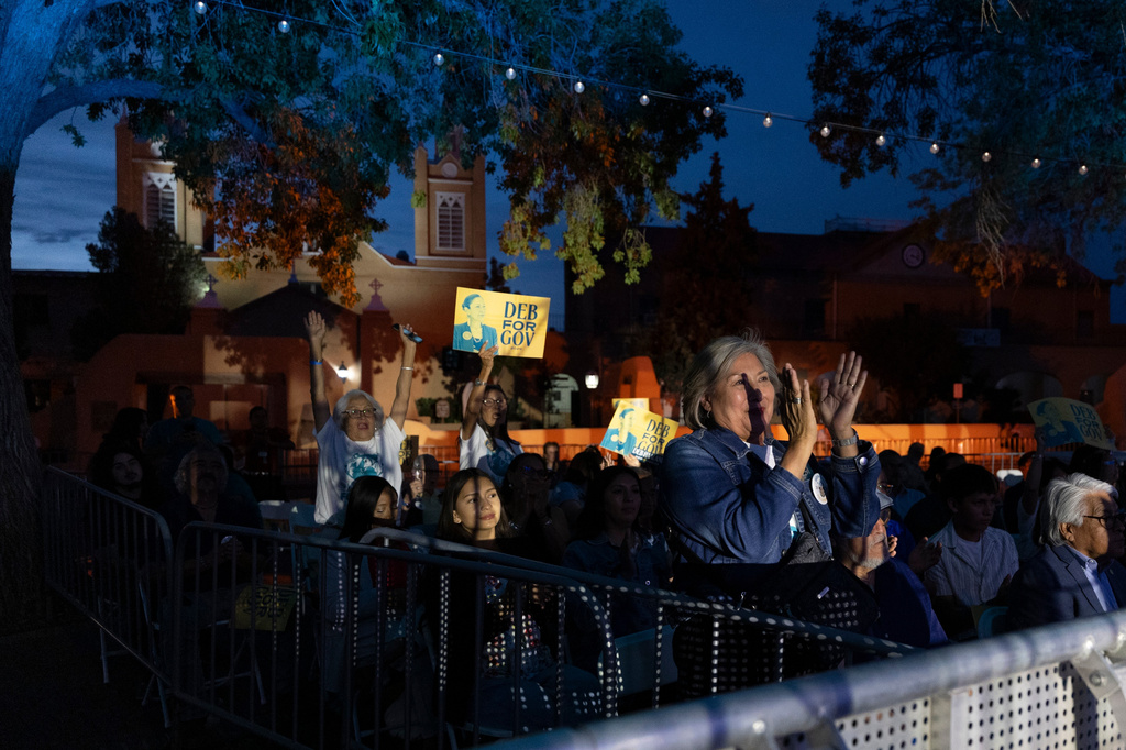 Supporters of Democratic gubernatorial candidate Deb Haaland await her arrival during a primary election night watch party, Tuesday, June 2, 2026, in Albuquerque, New Mexico. (AP Photo/Jon Austria)