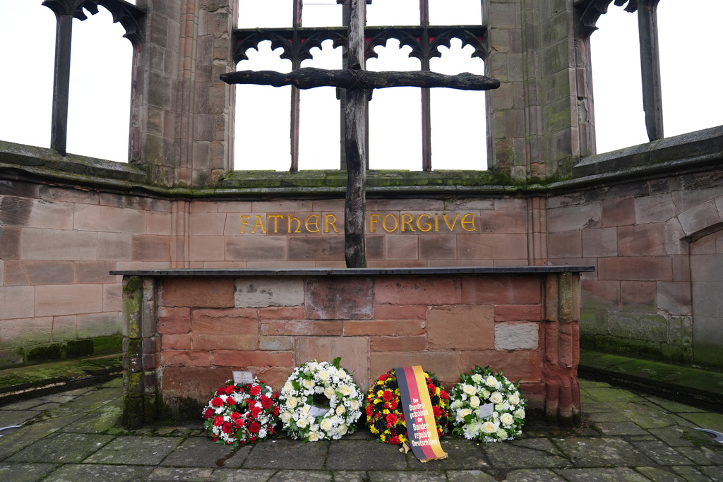 The wreaths laid on behalf of Britain's Duke of Kent, Germany's President Frank-Walter Steinmeier and his wife Elke Budenbender, at the old Coventry Cathedral, in Coventry, England, Friday, Dec. 5, 2025, on the final day of the state visit to the UK. (Jacob King/Pool Photo via AP)