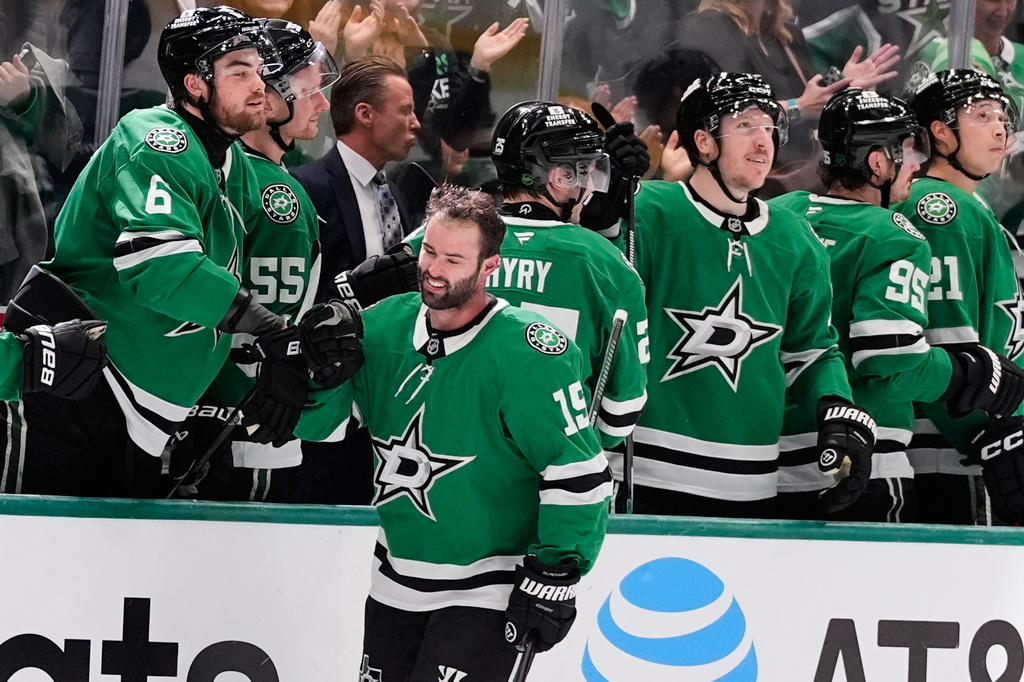 Dallas Stars center Colin Blackwell (15) celebrates with teammates after scoring against the Minnesota Wild in the second period of an NHL hockey game Thursday, April 9, 2026, in Arlington, Texas. (AP Photo/Tony Gutierrez)