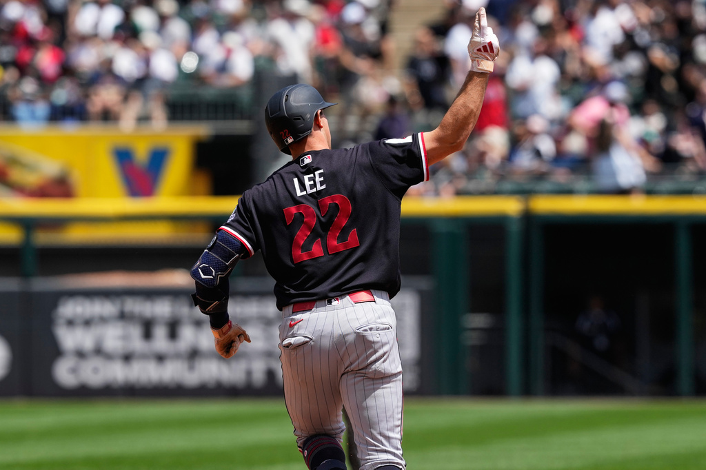 Minnesota Twins' Brooks Lee celebrates as he rounds the bases after hitting a solo home run during the first inning of a baseball game against the Chicago White Sox in Chicago, Monday, May 25, 2026. (AP Photo/Nam Y. Huh)