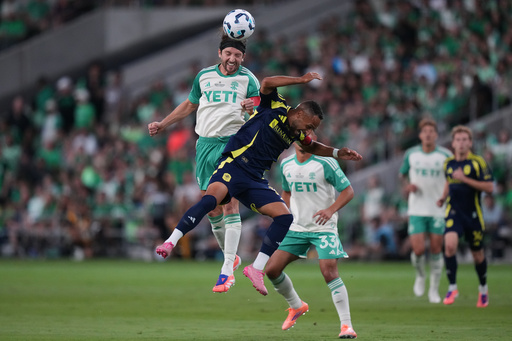 Austin FC midfielder Ilie S·nchez, left, heads the ball past Nashville SC midfielder Hany Mukhtar (10) during the first half of an U.S. Open Cup final soccer match in Austin, Texas, Wednesday, Oct. 1, 2025. (AP Photo/Eric Gay) Austin FC midfielder Ilie S·nchez, left, heads the ball past Nashville SC midfielder Hany Mukhtar (10) during the first half of an U.S. Open Cup final soccer match in Austin, Texas, Wednesday, Oct. 1, 2025. (AP Photo/Eric Gay)